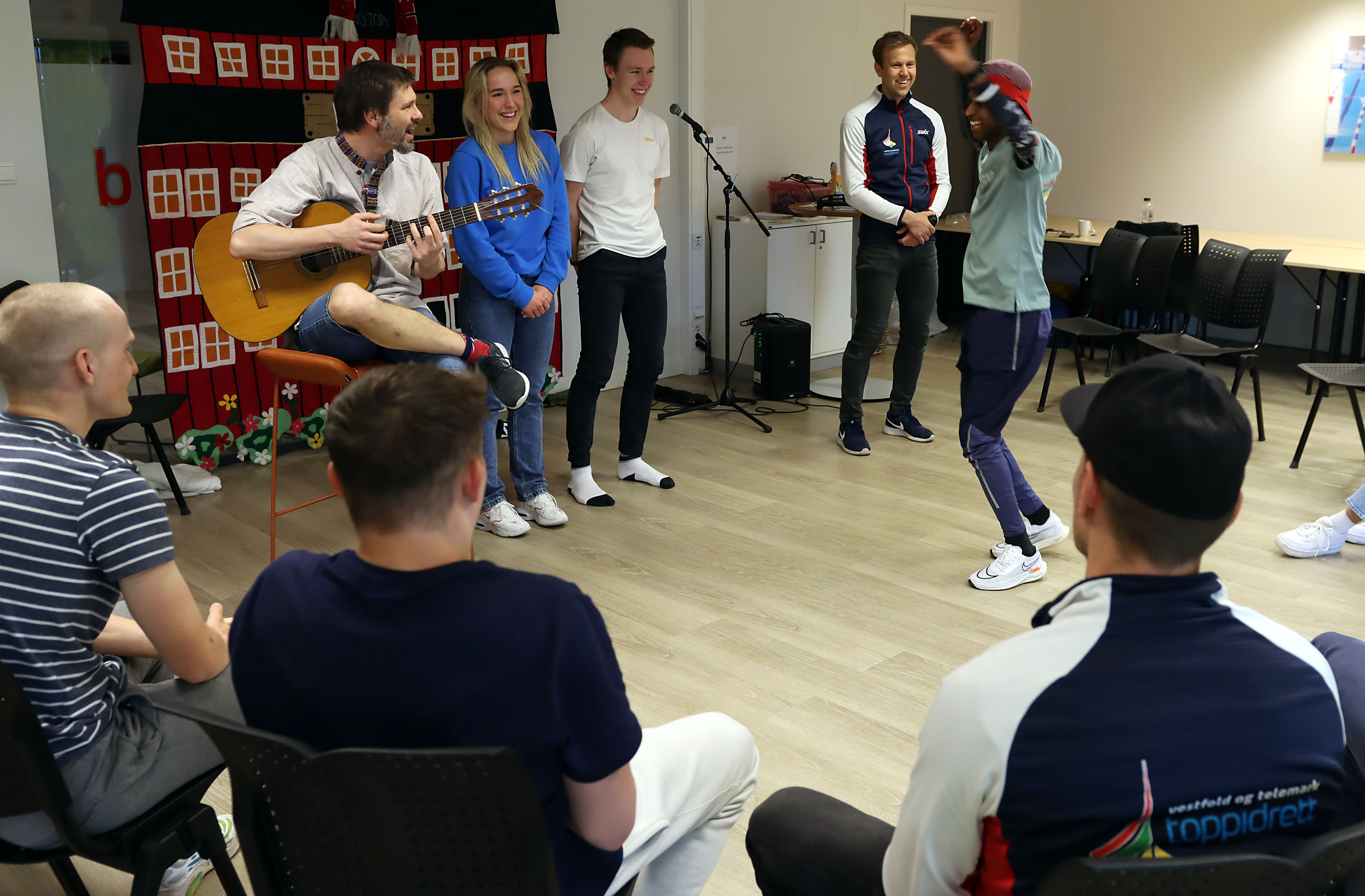 Bilde av idrettsutøvere på samling